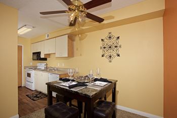 Dining Kitchen With Ceiling Fan at Sky Court Harbors at The Lakes Apartments, Las Vegas
